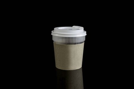 Close take-out coffee with cup holder. Isolated on black background with Reflections and  clippingの写真素材