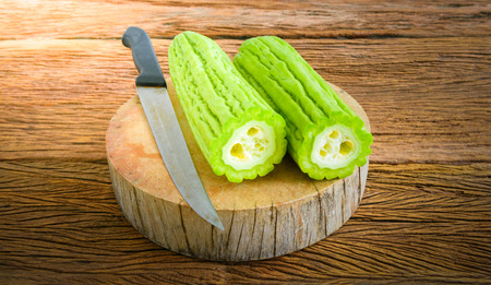 Chinese Bitter Gourd on wooden tableの写真素材
