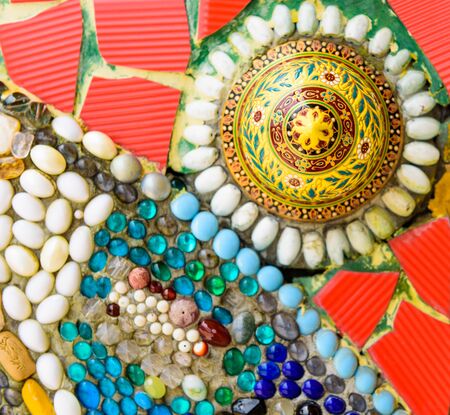 art of Colorful ceramic and stained Glass wall background at wat phra that pha son kaew. temple in Khao Kor, Phetchabun, Thailand.の写真素材