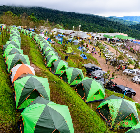 PHUTHAPBOEK PHETCHABUN THAILAND - OCTOBER 10 : Tent on the mountain with sunset at morning from view point ,Phu Thap Boek,  OCTOBER 10, 2015 in PHETCHABUN THAILANDのeditorial素材