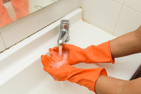 Washing Hands with streaming water in bathroom. Hygiene conceptの写真素材