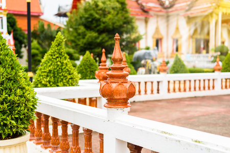 Architectural details at Wat Chalong temple in Phuket Thailandの写真素材