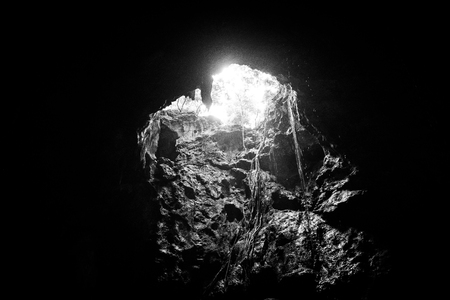 Light rays coming inside the Khao Luang cave. Khao Luang cave at Phetchaburi, Thailand. Black and White Color Effect.の写真素材