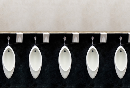 Modern Urinals in public toiletの写真素材