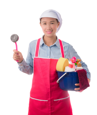 happy woman, maid, House wife  holding a bucket full of cleaning supplies isolated on white backgroundの写真素材