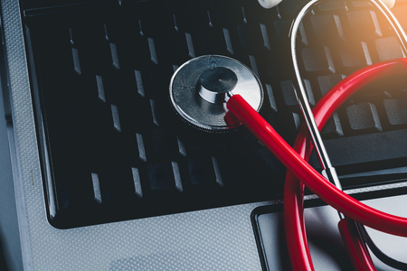 stethoscope on keyboard laptop computer. Medical Information and technology conceptの写真素材