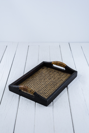 Wood Serving Tray, Kitchen Wooden Tray on white wooden table. vintage or retro styleの写真素材