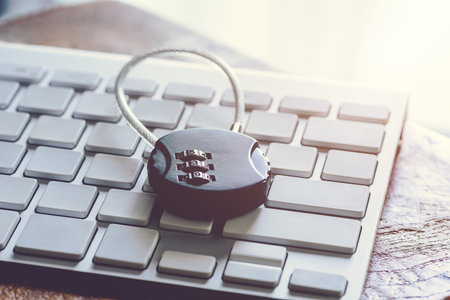 Close Black security lock with pass-code or password on computer keyboard, security concept in...