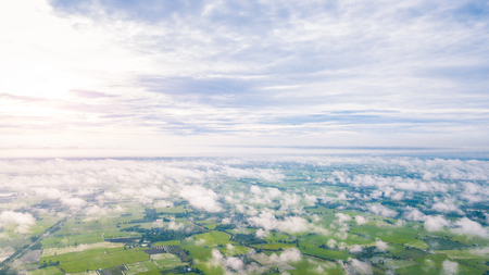 Aerial view of Cloudy sky high above the earth, Mountain and countryside scenery in Thailandの写真素材