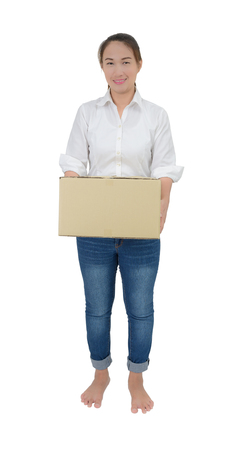 woman carrying and lifting boxes isolated on white background with clipping path. moving house conceptの写真素材