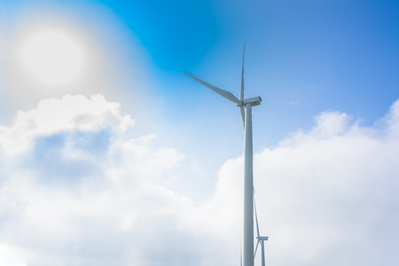View of turbine on mountain. Windmill turbine for electric production with blue sky at Khao Kho, Petchaboon, Thailand. Power and energy conceptsの写真素材
