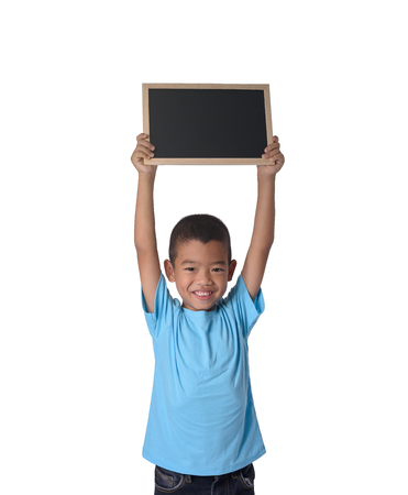Asian Cute Country boy with blank black chalkboard  for education conceptual isolated on white background with clipping pathの写真素材