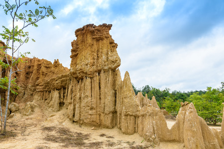 landscape of soil textures eroded sandstone pillars, columns and cliffs, natural erosion of water and wind, "Sao Din Na Noi"or "Hom Chom" and "Khok Suea" at sri nan national park in Nan Province, Thailandの写真素材