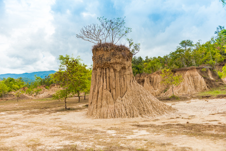 landscape of soil textures eroded sandstone pillars, columns and cliffs, natural erosion of water and wind, "Sao Din Na Noi"or "Hom Chom" and "Khok Suea" at sri nan national park in Nan Province, Thailandの写真素材