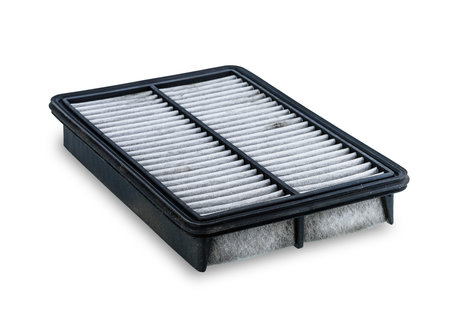 dirty air filter for car, automotive spare part in plastic case isolated on white background with...