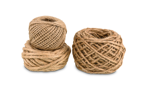 Group of different size hemp rope winded is a ball isolated on white background with clipping pathの写真素材