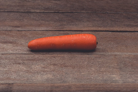 Fresh Organic Carrots on wooden table. Customize retro style images