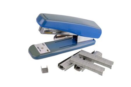 Office stationary Blue stapler with pile of staples isolated on white backgroundの写真素材