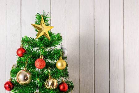 Close up Christmas tree and ornaments with copy spaceの写真素材