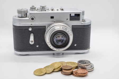 Creative photography, art, business and way of life,focus vintage camera and blur coin