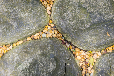 Natural stone floor,A small stone is between the big stones.の写真素材