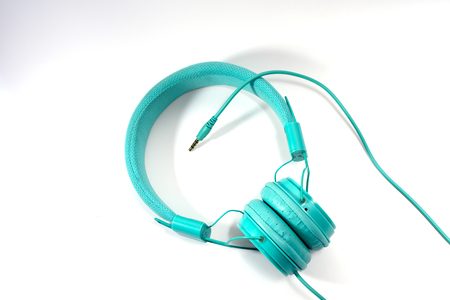 blue stylish earphone isolated over whiteの写真素材