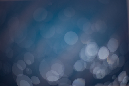 Dark blue is bokeh Background. The background with bokeh. Abstract texture. Color circles. Blurred.の写真素材