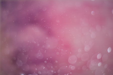 Pink Bokeh Background. The background with bokeh. Abstract texture. Color circles. Blurred.の写真素材