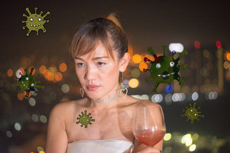 Seductive asian woman at night out in exclusive restaurant
