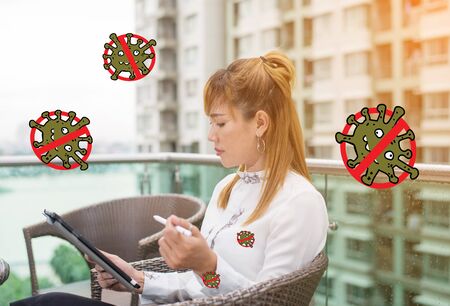 Senior asian woman Work from home and Social distancing protect Covid-19 and other Contagious diseaseの写真素材