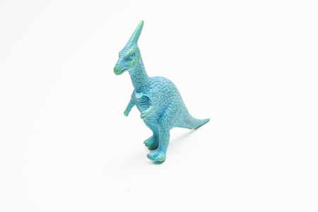 Dinosaur toy plastic figures on white backgroundの写真素材