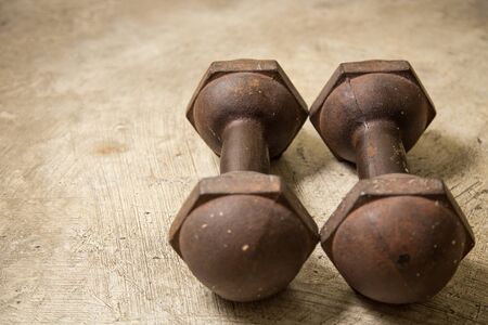 Dumbbell dirty vintage on floor image closeupの写真素材