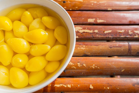 Sweet  Ginkgo Nut Soup ON bamboo table image top view
