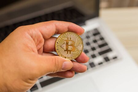 new crypto currency concept.Bitcoins ,Gold Coins ,Cryptocurrency with space for your Concept .の写真素材