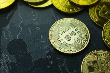 The Gold coin Bitcoin on dark map concept image picture for Background.の写真素材