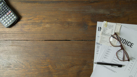 The  Business person working on wood table Flat lay background.