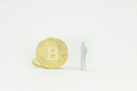The white miniature and gold coin bitcoin abstract image close up background.の写真素材