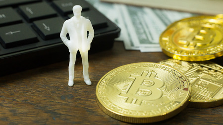 The white miniature and gold coin bitcoin abstract image close up background.の写真素材