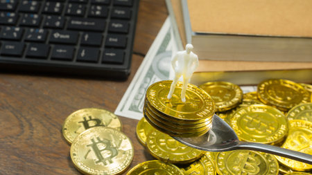 The white miniature and gold coin bitcoin abstract image close up background.