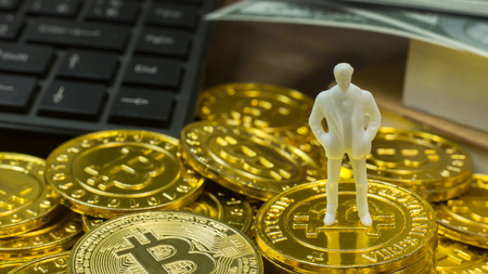 The white miniature and gold coin bitcoin abstract image close up background.の写真素材