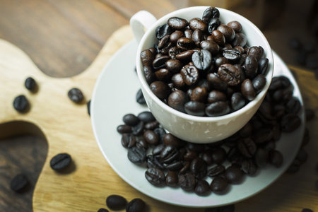 coffee beans vintage mood and tone on wood table