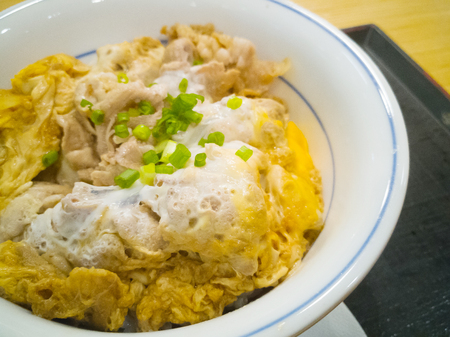 Oyakodon  on wood table Japanese food image close up.のeditorial素材
