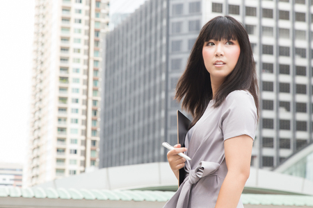 young Asian beauty woman Casual wear dress working day outdoor light for background.の写真素材