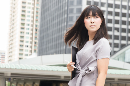 young Asian beauty woman Casual wear dress working day outdoor light for background.の写真素材