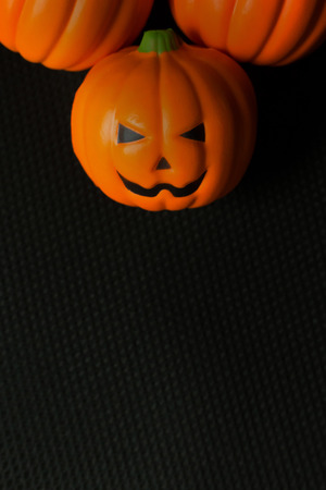 Halloween pumpkin jack in black holiday background image.の写真素材