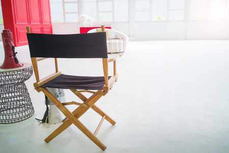 Behind the scenes the director chair in white setの写真素材
