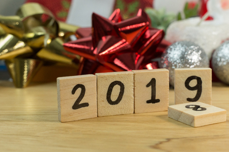 The celebration Time new year 2019 on wood plate.の写真素材
