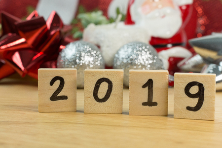 The celebration Time new year 2019 on wood plate.の写真素材