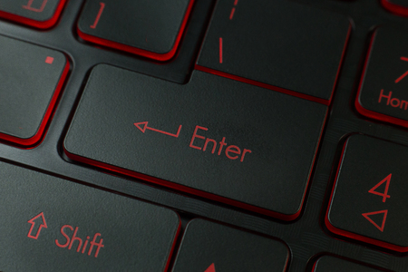 Enter button on keyboard laptop close up image.の写真素材