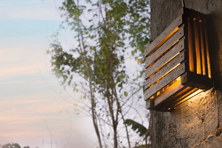 The diy wood lamp on wall in morning time.の写真素材